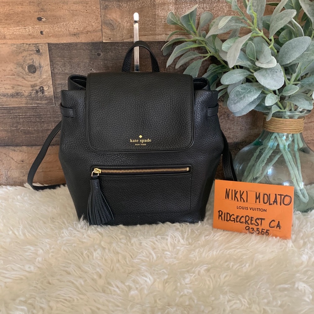 100% guarantee authentic pre owned Kate spade